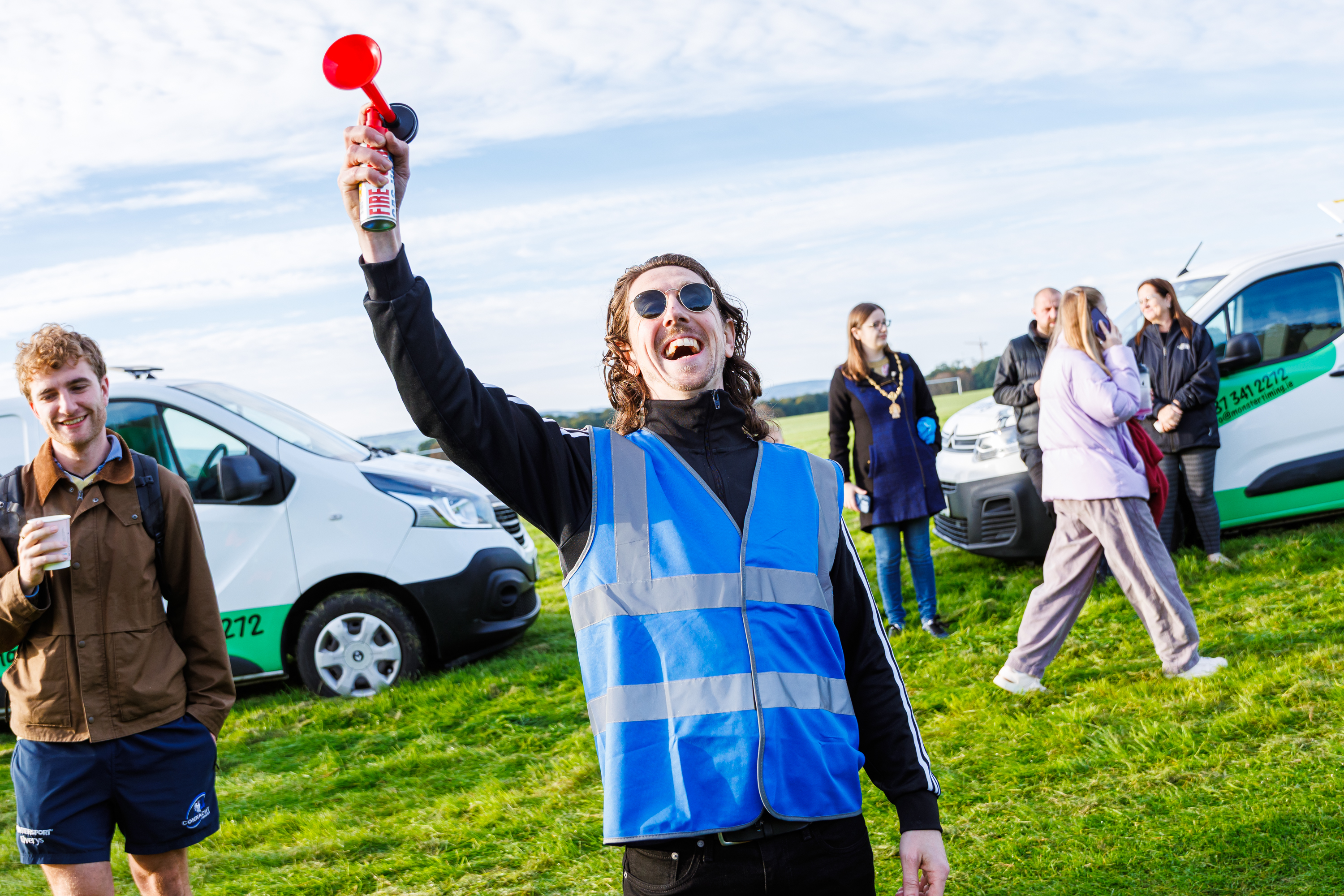 Gaelathon race organiser Ruairí Ó hÉideáin starts the race with a red horn
